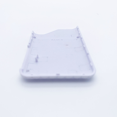 Processus de moulage par injection de l'ABS IMD à haute brillance outre du modèle de grille blanc